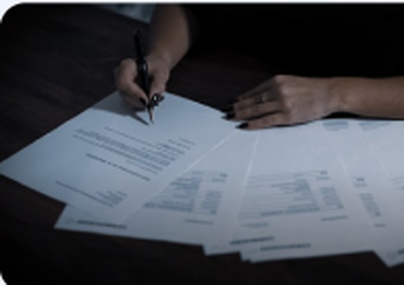 Hand signing Medicare plan documents